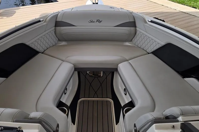 Slide: The Image of 2023 Sea Ray SLX 280 Outboard boat interior with luxurious seating and elegant design. - 4