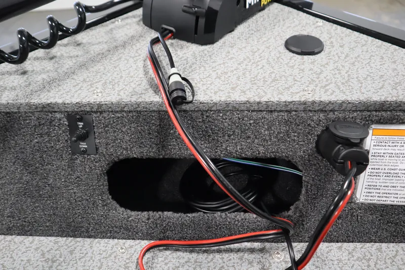 Slide: The Image of 2026 Lowe Fishing Machine 175 boat interior with wiring and control panel. - 14