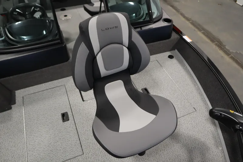 Slide: The Image of 2026 Lowe Fishing Machine 175 boat seat, gray and black design, interior view. - 15