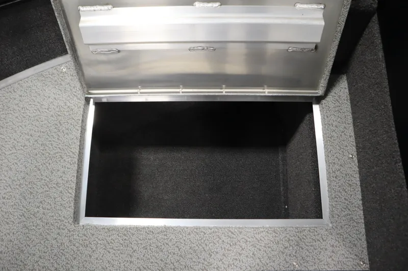 Slide: The Image of Open storage compartment in 2026 Lowe Fishing Machine 175 boat. - 19