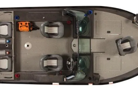 Slide: The Image of 2026 Lowe Fishing Machine 175 boat in indoor storage, black exterior, on trailer. - 2