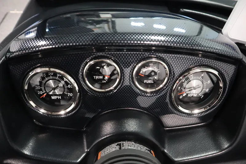 Slide: The Image of Dashboard of 2026 Lowe Fishing Machine 175 with speedometer, trim, fuel, and RPM gauges. - 25