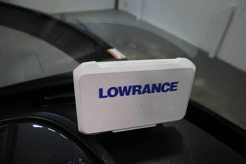 Slide: The Image of 2026 Lowe Fishing Machine 175 with Lowrance device on dashboard. - 26