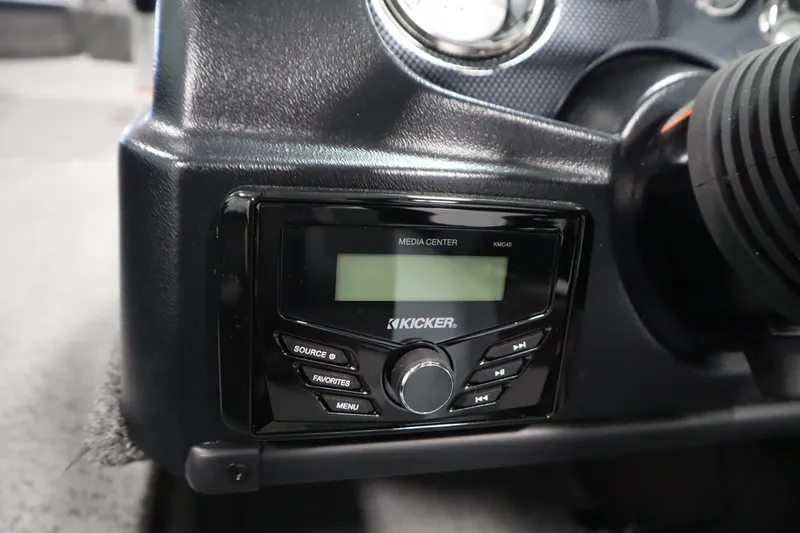 Slide: The Image of 2026 Lowe Fishing Machine 175 dashboard with Kicker media center. - 28