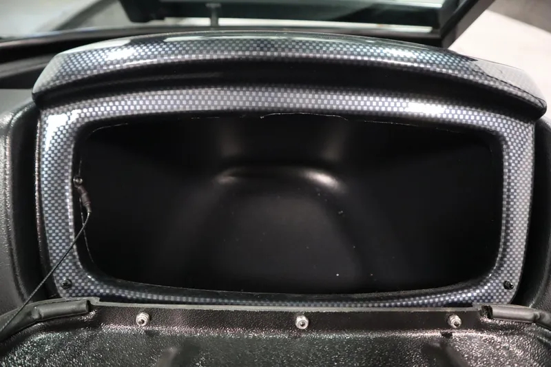 Slide: The Image of Open storage compartment in 2026 Lowe Fishing Machine 175 boat. - 33