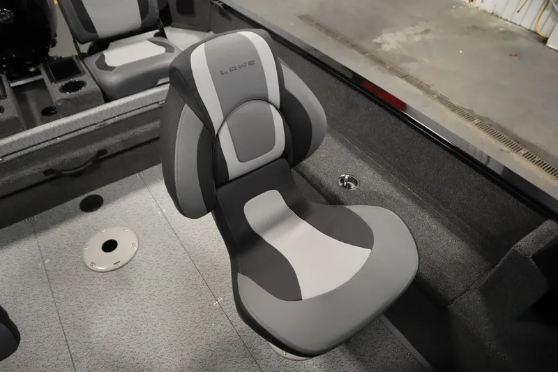 Slide: The Image of 2026 Lowe Fishing Machine 175 boat interior with gray and black seating. - 34