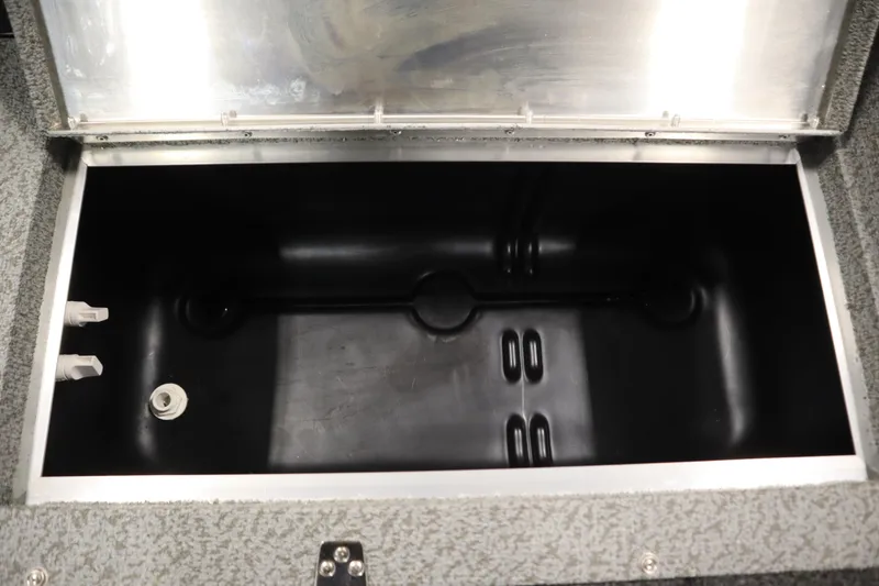 Slide: The Image of Open storage compartment in 2026 Lowe Fishing Machine 175 boat. - 41