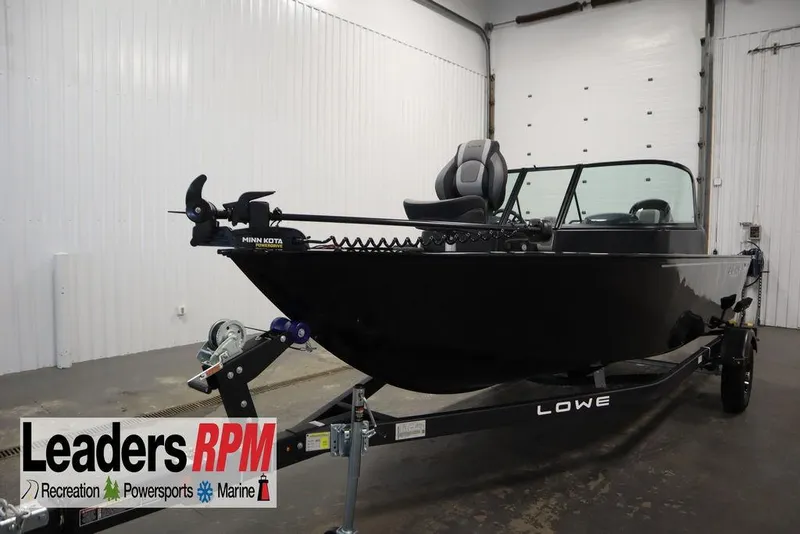 Slide: The Image of 2026 Lowe Fishing Machine 175 boat in showroom, featuring Minn Kota trolling motor. - 59
