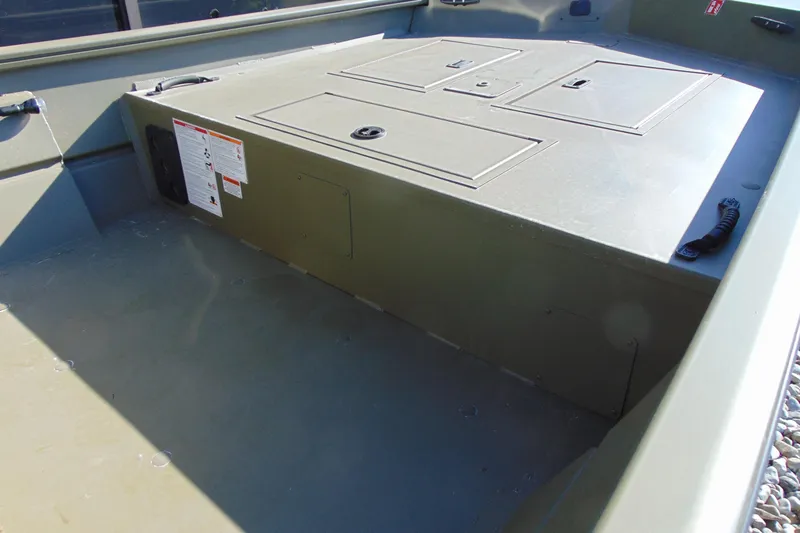 Slide: The Image of 2026 Crestliner 1860 Retriever CC boat interior with storage compartments. - 9