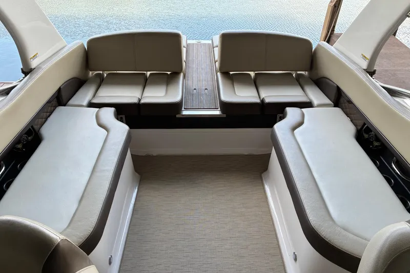 Slide: The Image of 2014 Regal 2500 Bowrider interior with spacious seating and elegant design. - 11