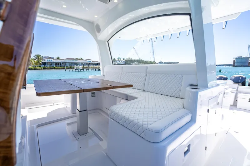 Slide: The Image of Luxurious seating area on 2026 HCB 65 Estrella yacht with ocean view. - 14