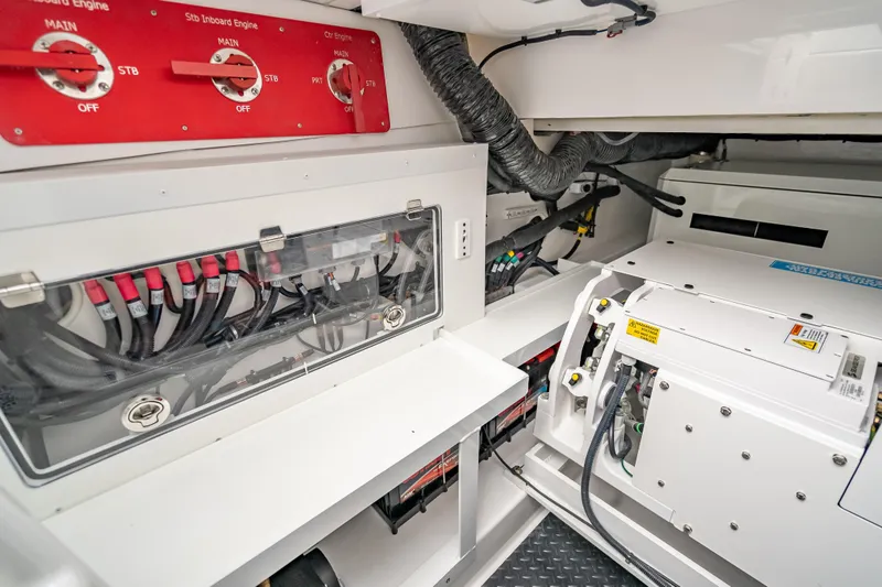 Slide: The Image of Engine room of 2026 HCB 65 Estrella, showcasing wiring and control panels. - 33