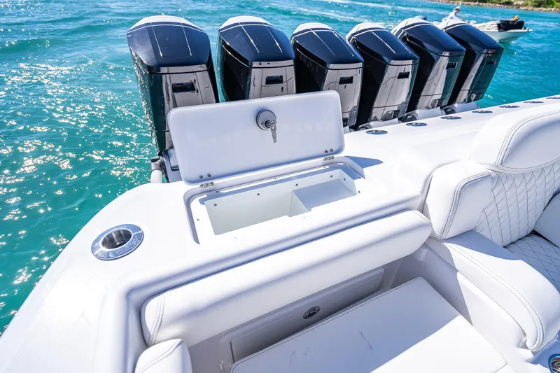 Slide: The Image of 2026 HCB 65 Estrella boat with multiple engines and luxurious seating. - 36