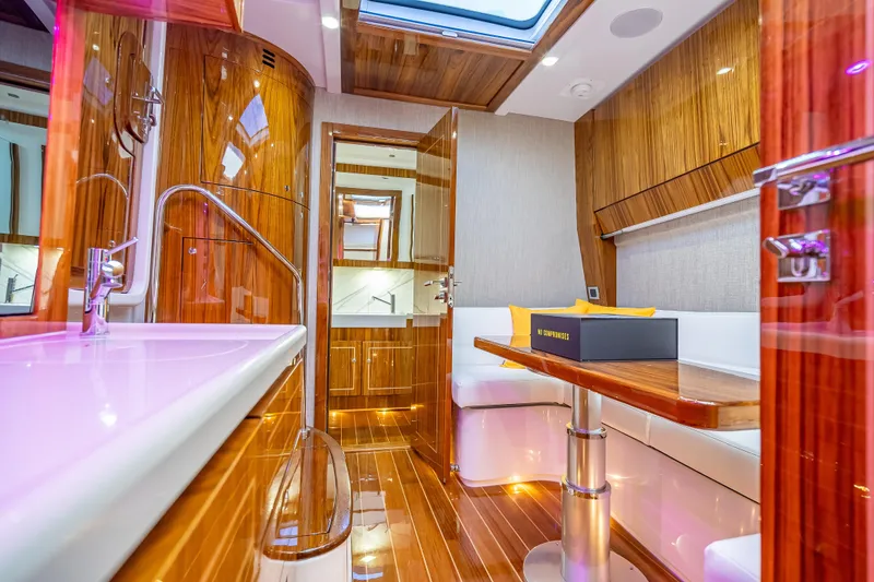 Slide: The Image of Luxurious interior of 2026 HCB 65 Estrella yacht with wood finishes and modern amenities. - 8