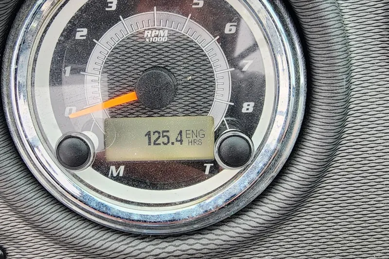 Slide: The Image of Close-up of 2015 Yamaha Boats 212X tachometer showing 125.4 engine hours. - 34