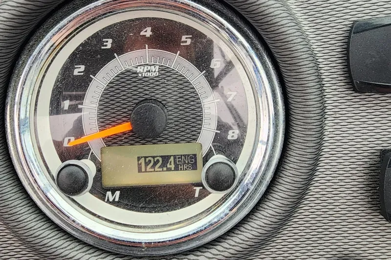 Slide: The Image of Close-up of 2015 Yamaha Boats 212X tachometer showing 122.4 engine hours. - 35