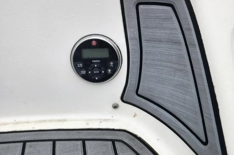 Slide: The Image of Control panel on 2015 Yamaha Boats 212X with textured flooring. - 37