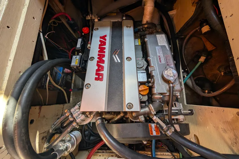 Slide: The Image of Engine compartment of a 1982 Shannon Pilothouse with a Yanmar engine. - 17