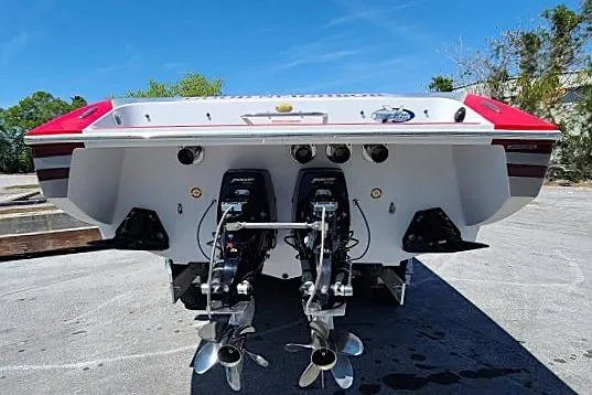 Slide: The Image of 2007 Donzi 38 ZR boat rear view with dual engines and propellers. - 3