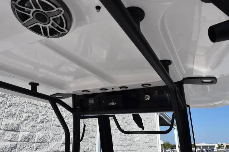 Slide: The Image of 2026 Sea Hunt Ultra 275 SE boat interior with speaker and control panel. - 10