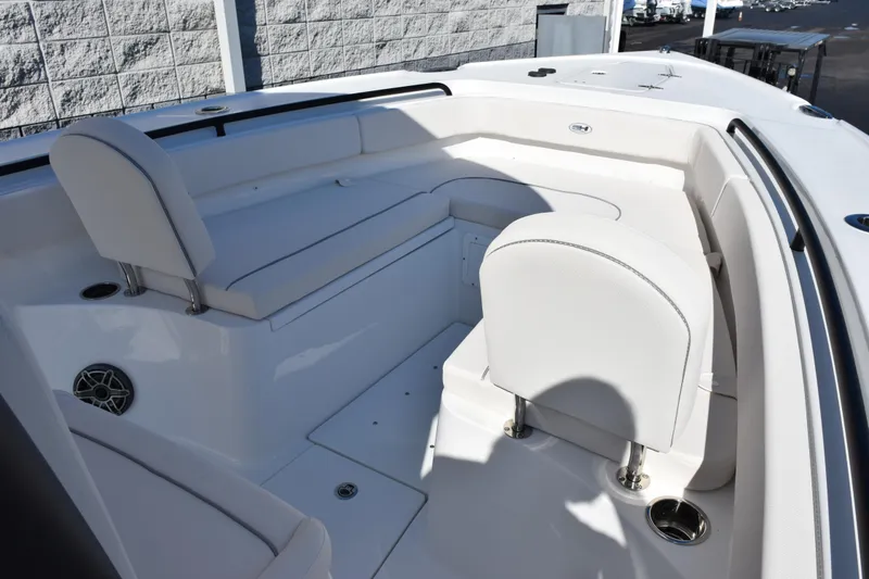 Slide: The Image of 2026 Sea Hunt Ultra 275 SE boat interior with white seating and modern design. - 12