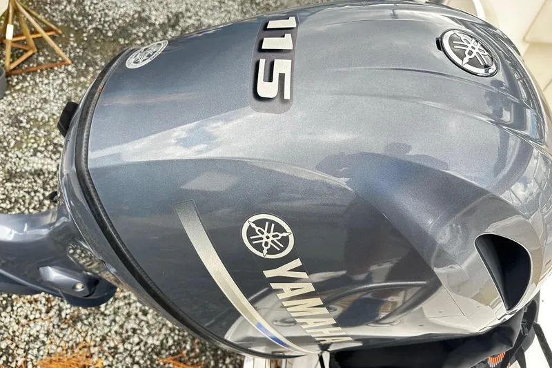 Slide: The Image of Yamaha 115 outboard motor on 2017 Robalo R180 Center Console boat. - 13