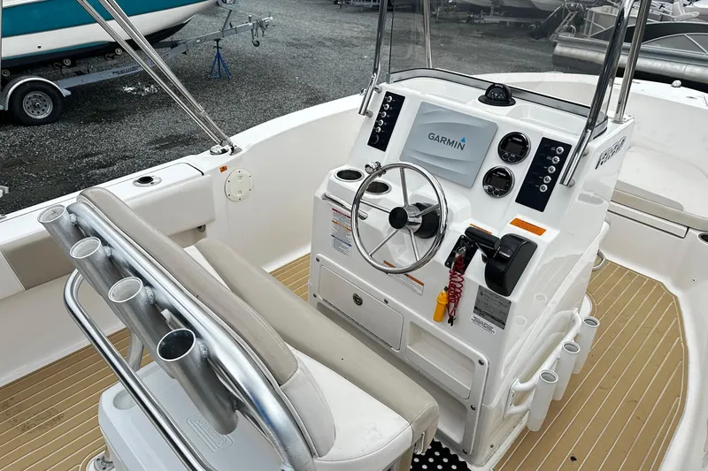 Slide: The Image of 2017 Robalo R180 Center Console boat interior with Garmin navigation system. - 5
