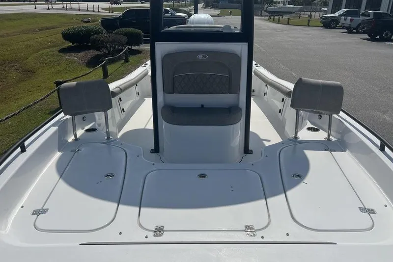 Slide: The Image of 2026 Sea Hunt BX 25 FS boat interior with seating and storage compartments. - 11