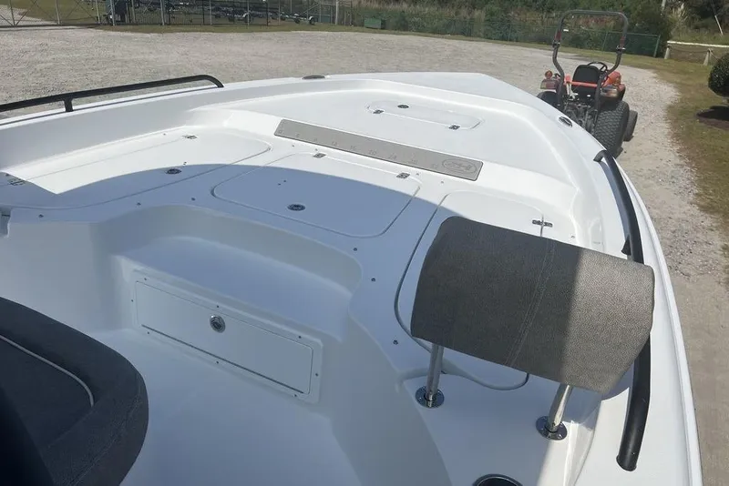 Slide: The Image of 2026 Sea Hunt BX 25 FS boat deck with seating and storage compartments. - 14