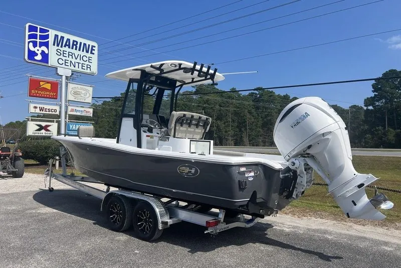 Slide: The Image of 2026 Sea Hunt BX 25 FS boat on trailer at Marine Service Center. - 3