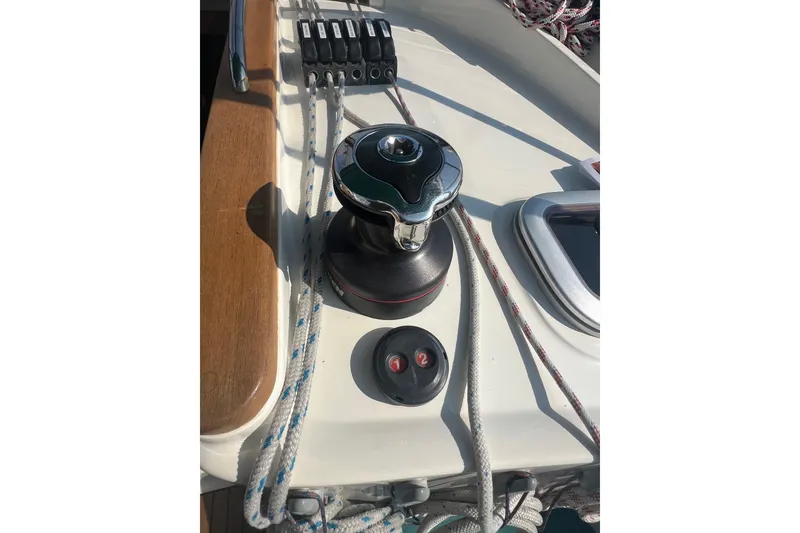 Slide: The Image of Deck of 2012 Delphia 47 sailboat with winch and control panel. - 13