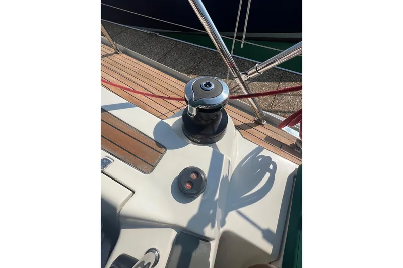 Slide: The Image of Deck of 2012 Delphia 47 sailboat with winch and control buttons. - 15