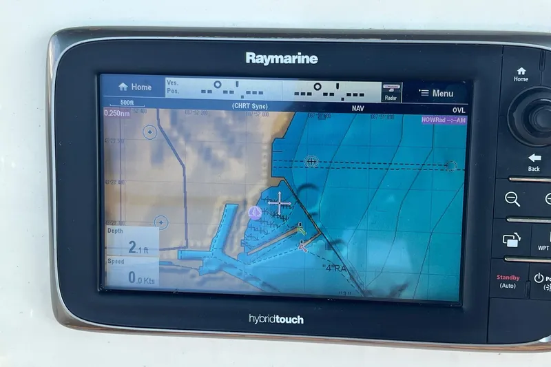 Slide: The Image of Raymarine navigation display on 2012 Delphia 47 sailboat, showing nautical chart and depth. - 18