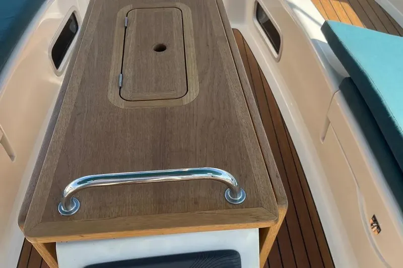 Slide: The Image of Wooden deck detail of 2012 Delphia 47 yacht with metal handle. - 25