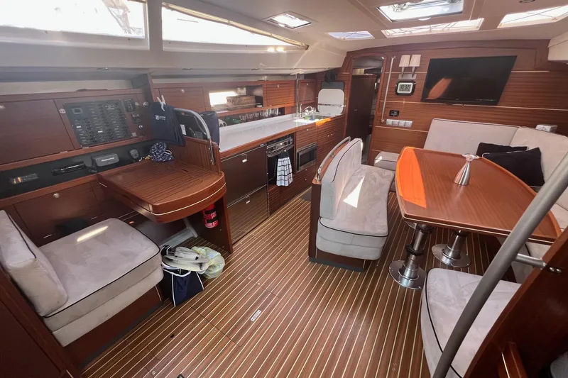 Slide: The Image of Luxurious interior of a 2012 Delphia 47 yacht with wood finish and modern amenities. - 33