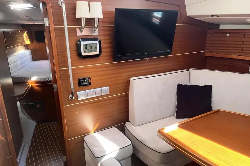 Slide: The Image of Luxurious interior of 2012 Delphia 47 yacht with cozy seating and modern amenities. - 40