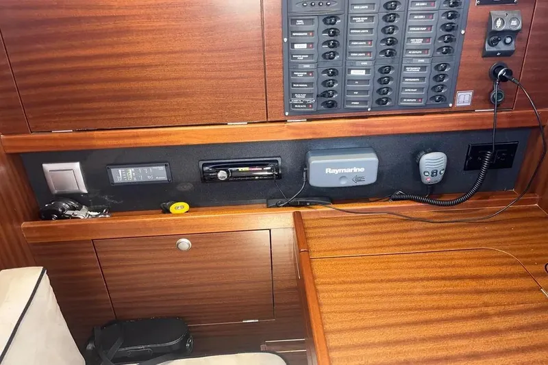 Slide: The Image of Control panel of a 2012 Delphia 47 yacht with navigation equipment. - 50