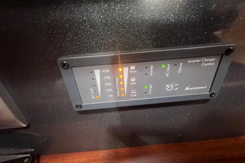 Slide: The Image of Mastervolt inverter charger control panel on a 2012 Delphia 47 yacht. - 52