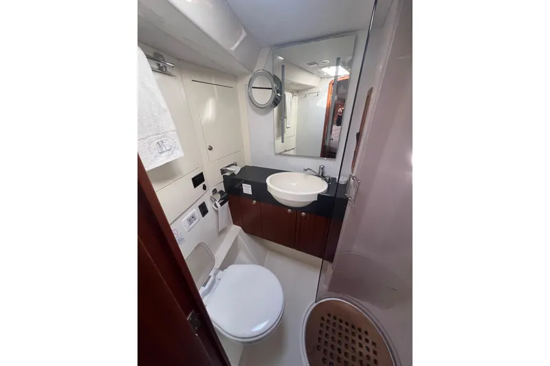 Slide: The Image of Bathroom interior of 2012 Delphia 47 yacht with modern fixtures and mirror. - 75