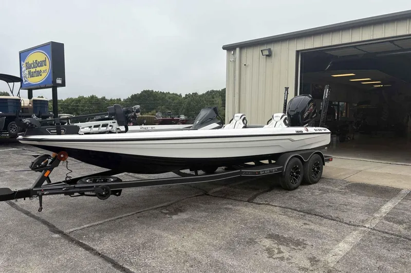 Slide: The Image of 2026 Skeeter ZXE21 boat on trailer at Blackbeard Marine dealership. - 3