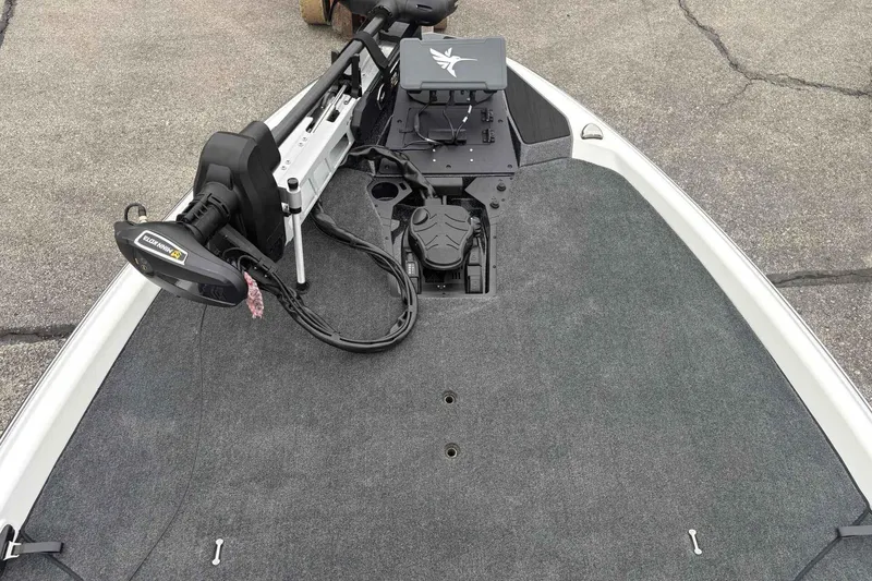 Slide: The Image of 2026 Skeeter ZXE21 boat deck with trolling motor and control panel. - 8