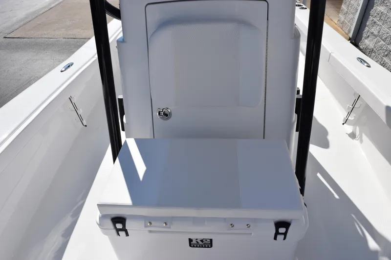 Slide: The Image of 2026 BlackJack 256 Coastal boat interior with seating and storage compartment. - 13