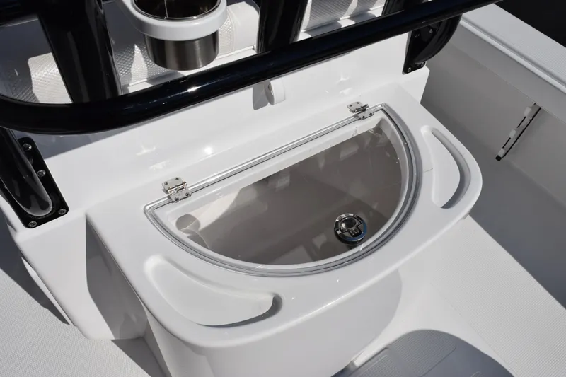 Slide: The Image of 2026 BlackJack 256 Coastal boat with a sleek, modern livewell design. - 18