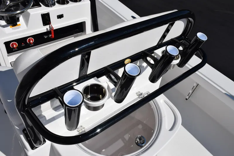 Slide: The Image of 2026 BlackJack 256 Coastal boat console with rod holders and cup holders. - 19