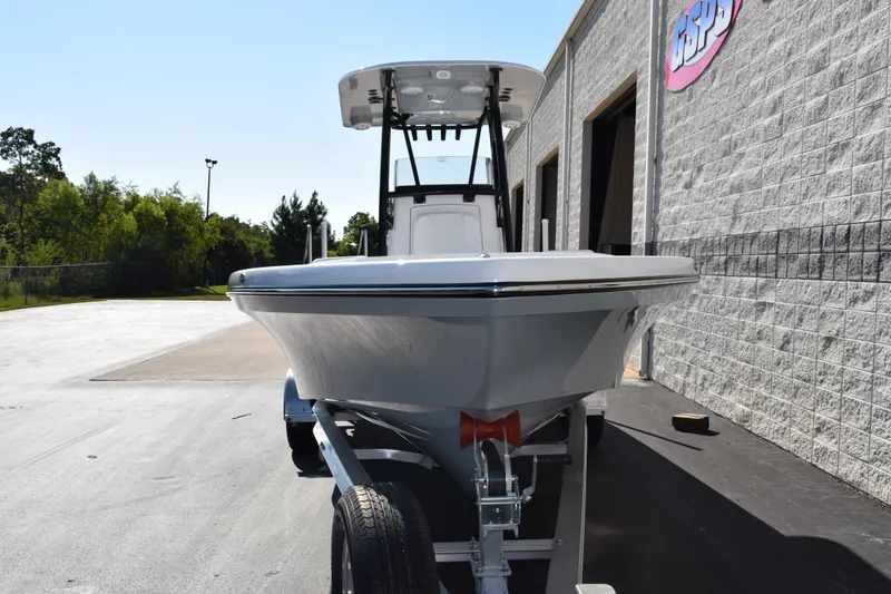 Slide: The Image of 2026 BlackJack 256 Coastal boat on trailer outside a building. - 3