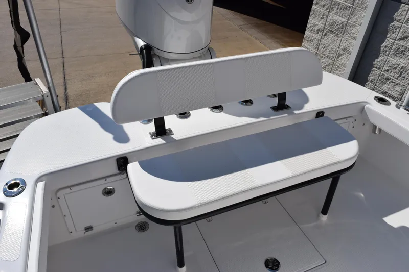 Slide: The Image of 2026 BlackJack 256 Coastal boat seating area with white cushioned bench and storage compartments. - 8