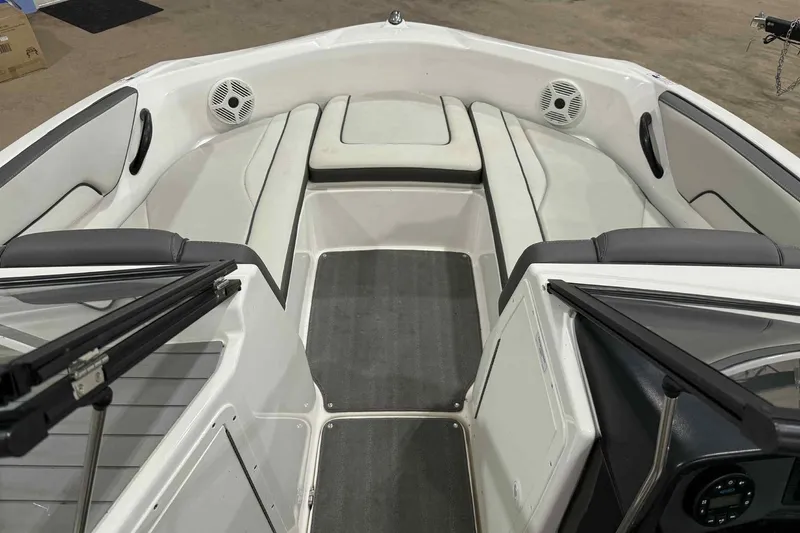 Slide: The Image of 2022 Yamaha Boats SX190 interior with seating and speakers, showcasing modern design and comfort. - 9