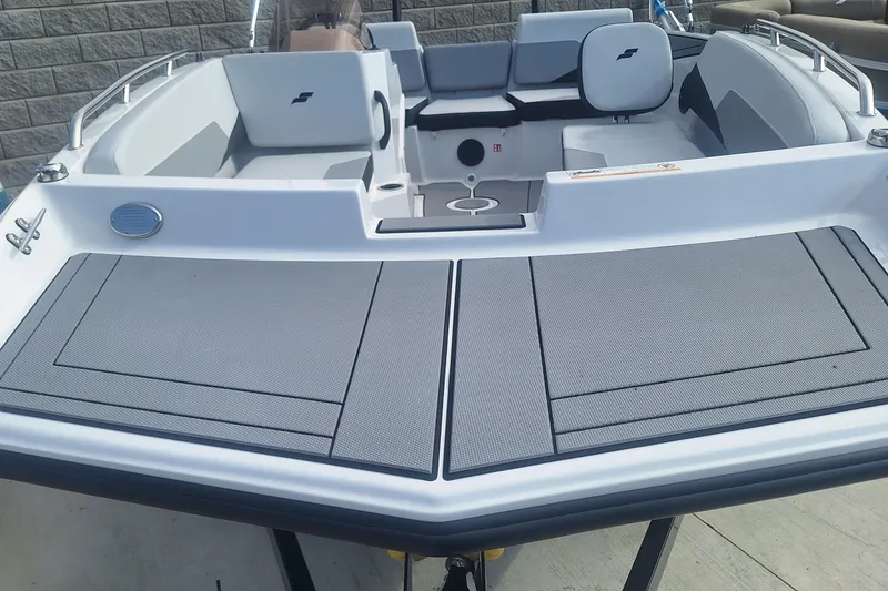 Slide: The Image of 2026 Starcraft SV 16 OB boat interior with seating and storage compartments. - 12