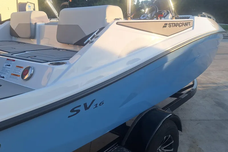 Slide: The Image of 2026 Starcraft SV 16 OB boat on trailer, featuring sleek design and comfortable seating. - 3