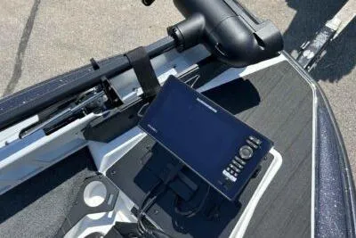 Slide: The Image of 2026 Skeeter ZXE20 boat dashboard with advanced navigation system and controls. - 9